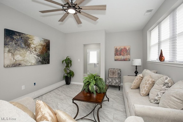 living room with ceiling fan