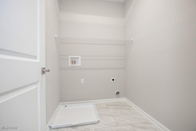 clothes washing area featuring hookup for a washing machine and electric dryer hookup