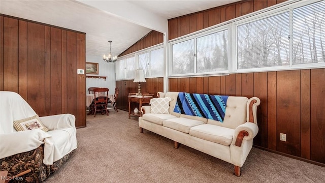 living area featuring vaulted ceiling with beams, a chandelier, carpet, and wood walls