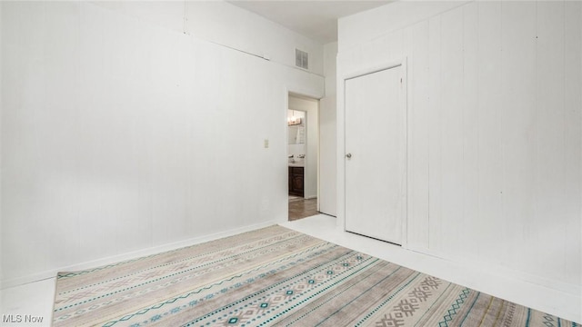 empty room with light wood-type flooring