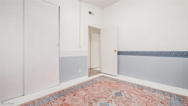 unfurnished bedroom with light tile patterned floors