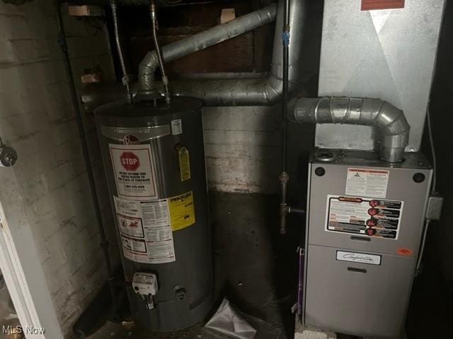 utility room with water heater