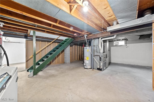 basement with water heater and heating unit