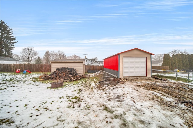 view of snow covered garage