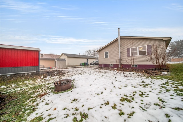 view of snow covered house