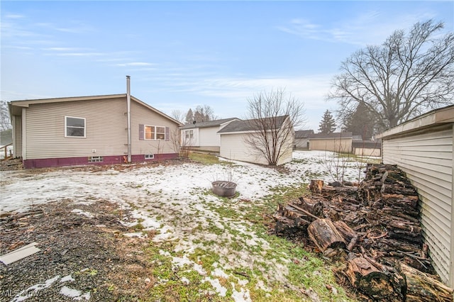 view of yard covered in snow