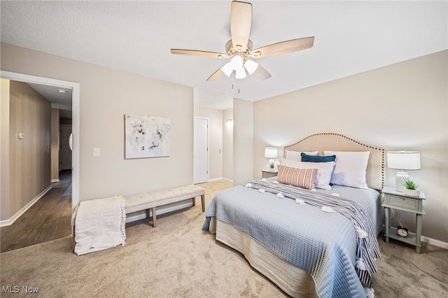 bedroom with carpet and ceiling fan