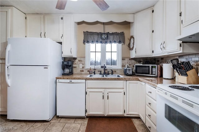 24886 Sherman St, Homeworth, OH 44634 - kitchen featuring white appliances, white cabinetry, decorative backsplash, and a sink