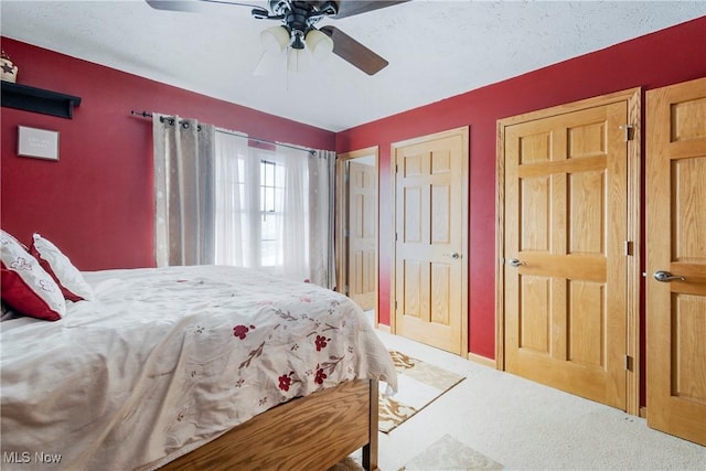 24886 Sherman St, Homeworth, OH 44634 - carpeted bedroom with a ceiling fan