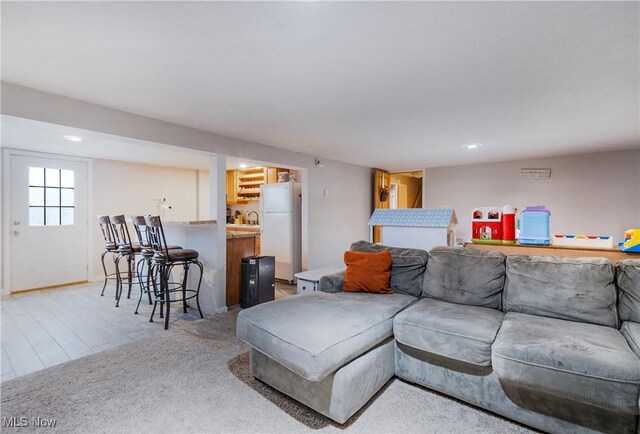 24886 Sherman St, Homeworth, OH 44634 - living room with recessed lighting and indoor bar
