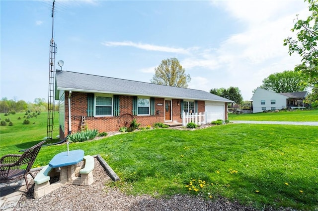 24886 Sherman St, Homeworth, OH 44634 - single story home featuring a garage, a front lawn, and brick siding