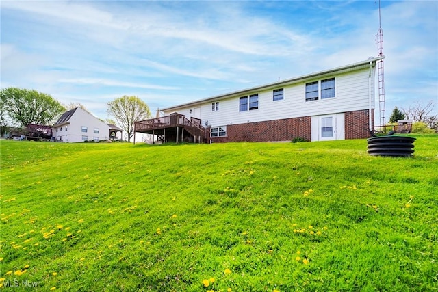 24886 Sherman St, Homeworth, OH 44634 - back of house featuring a yard and a deck