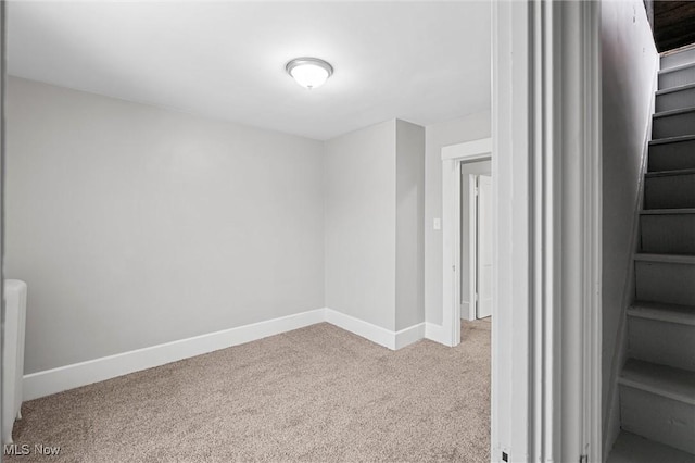 spare room featuring carpet flooring