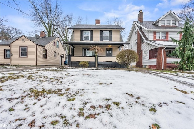 view of front property with covered porch