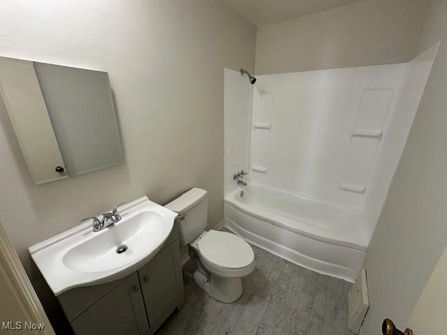 full bathroom with vanity, toilet, and shower / bath combination