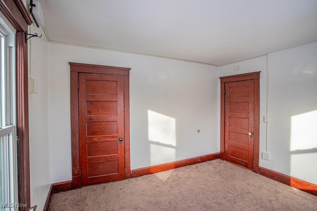 spare room featuring carpet flooring