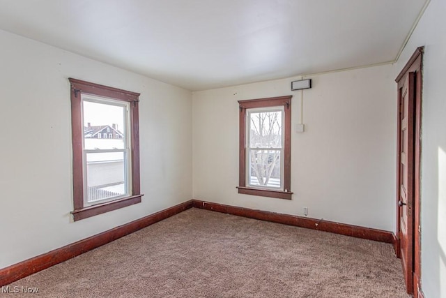 view of carpeted spare room