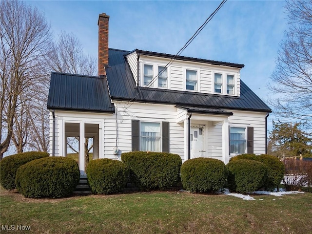 exterior space with a front lawn