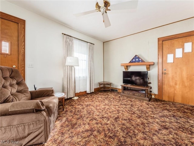 carpeted living room featuring ceiling fan