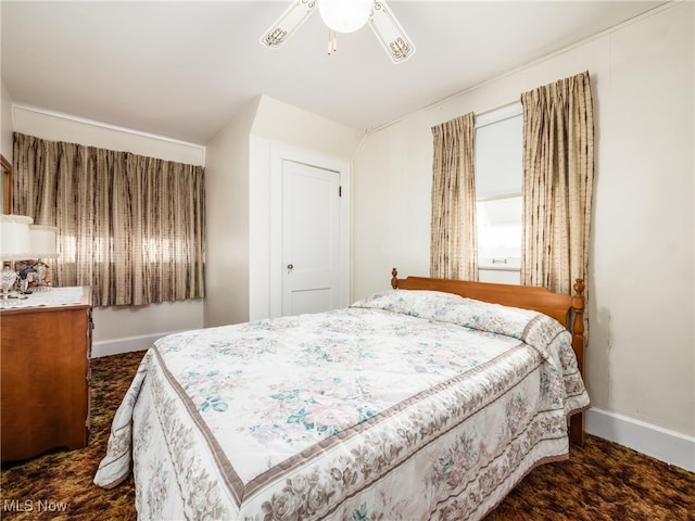 bedroom featuring ceiling fan