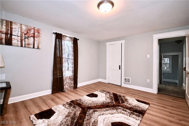 living area with wood-type flooring