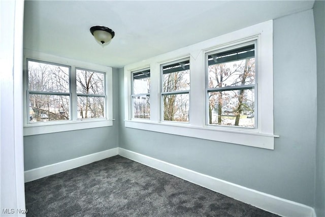 unfurnished sunroom featuring a healthy amount of sunlight