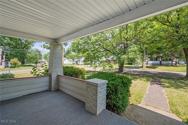 view of patio featuring a porch