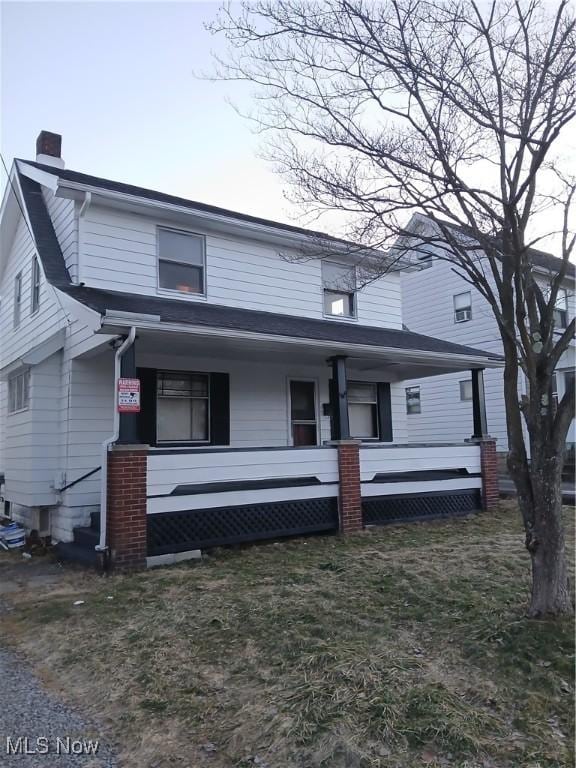 view of front of home with covered porch