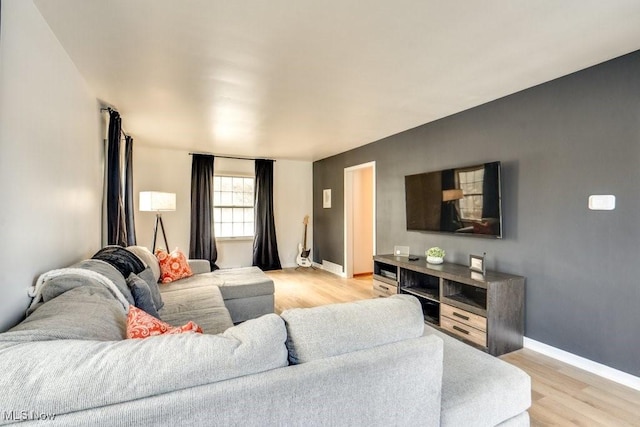 living room with light hardwood / wood-style floors