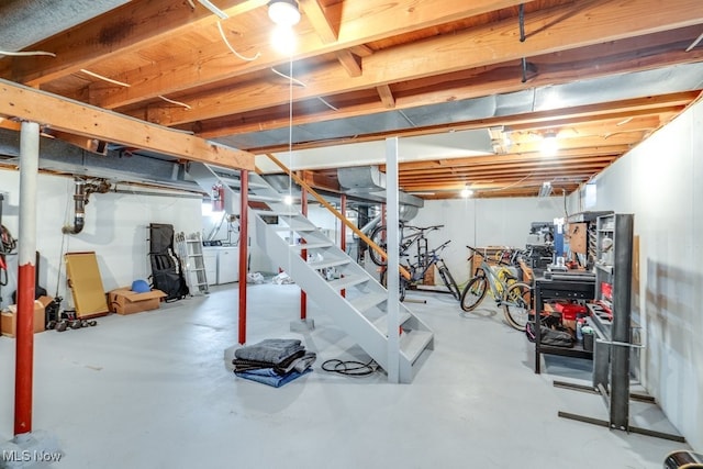 exercise area with separate washer and dryer