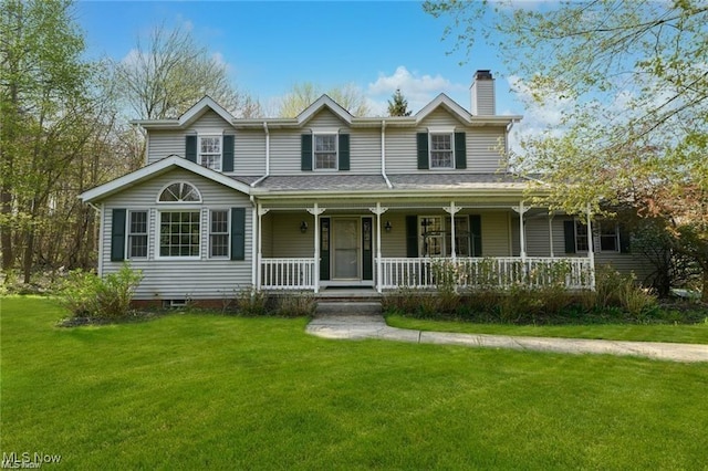 view of front of house featuring a front lawn and covered porch