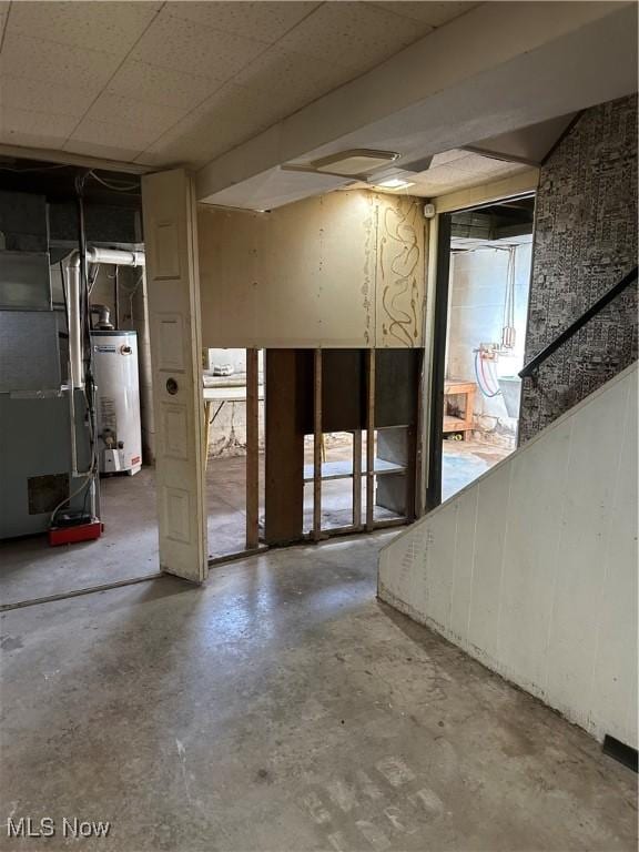 basement with heating unit and water heater