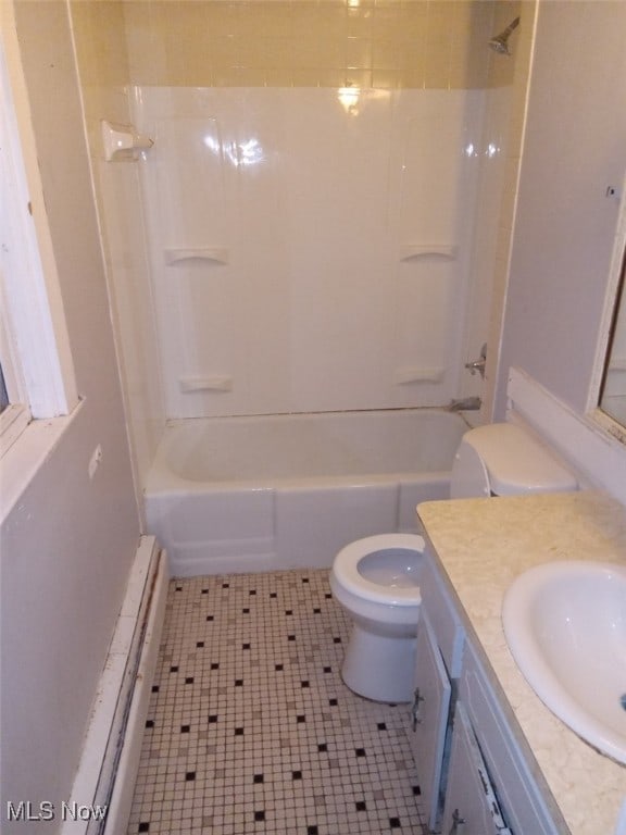 full bathroom featuring shower / tub combination, vanity, and toilet