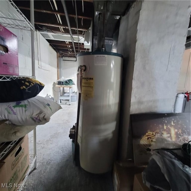 utility room with water heater