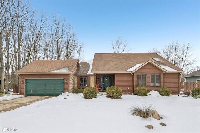 ranch-style home with a garage