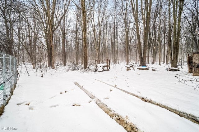 view of snow covered land