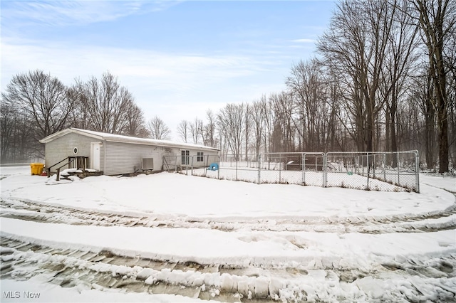 view of snow covered property