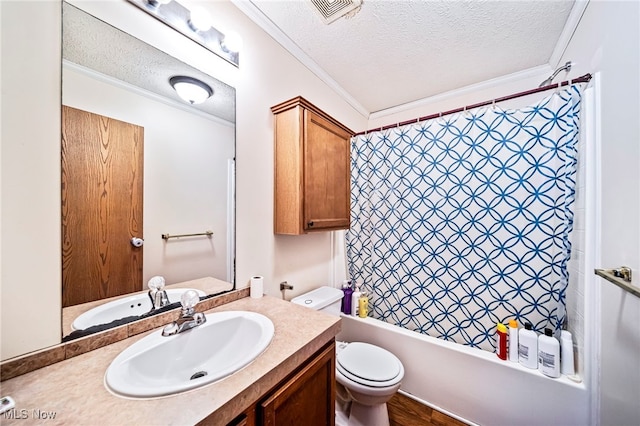 full bathroom with a textured ceiling, ornamental molding, toilet, and shower / bath combo with shower curtain