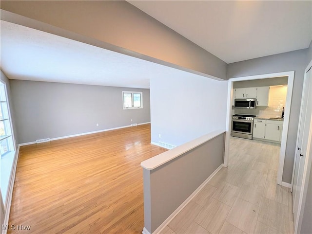 hall featuring light wood-type flooring