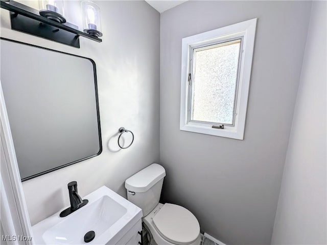 bathroom featuring sink and toilet