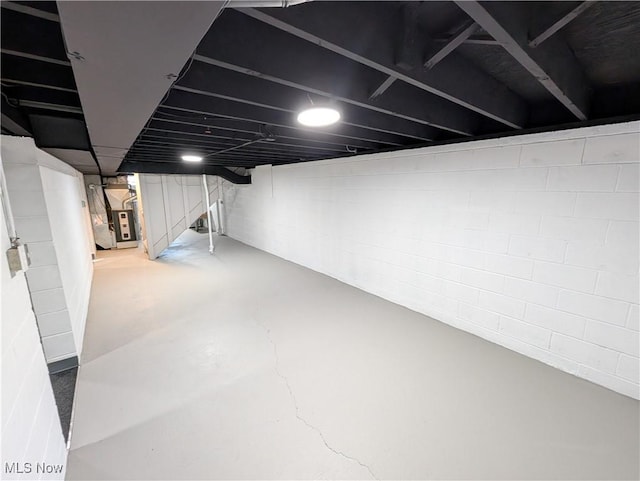 basement featuring heating unit