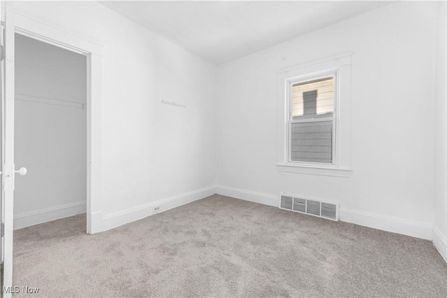 view of carpeted spare room