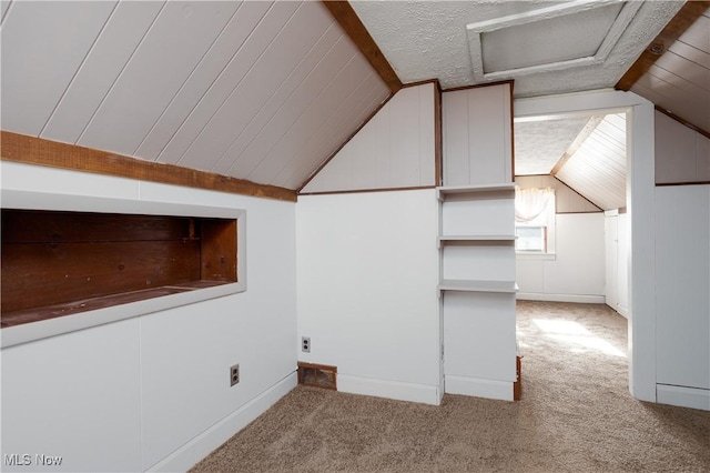 additional living space featuring lofted ceiling and light carpet