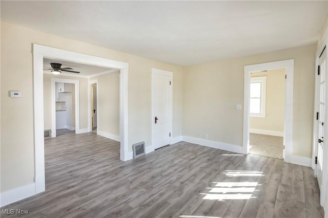 unfurnished room featuring light wood-type flooring