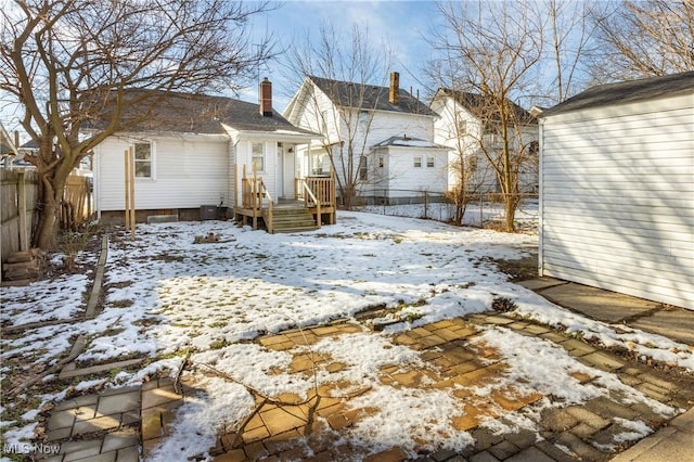 view of snow covered property