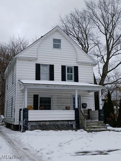 view of front of property featuring covered porch