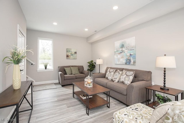 living room with light hardwood / wood-style floors