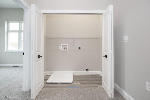 laundry area featuring carpet flooring, hookup for a washing machine, and electric dryer hookup