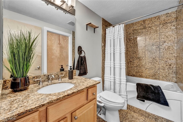 full bathroom with vanity, shower / bath combination with curtain, a textured ceiling, and toilet