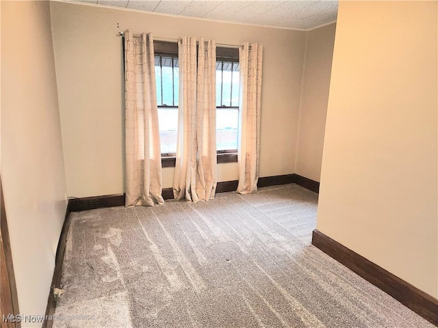 view of carpeted spare room